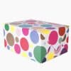Colorful dot-patterned gift box, perfect for packaging treats or gifts, from The Wraperie. Bright, festive decor for special occasions and celebrations.