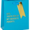 "Blue gift bag with gold accent and ribbon featuring a heartfelt message for Father's Day celebration.".