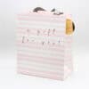 Gift bag with pink and white stripes, "a gift for you!" message, perfect for special occasions, shopping, or parties. Elegant, stylish wrapping for presents from The Wraperie.