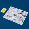 Colorful hand-drawn doodle art sheet featuring cityscape, music, food, and celebration themes for creative expression and entertainment.