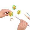 Bright, colorful avocado-shaped stationery erasers with playful, kawaii designs perfect for kids and teens, added to creative school supplies or desk decor.