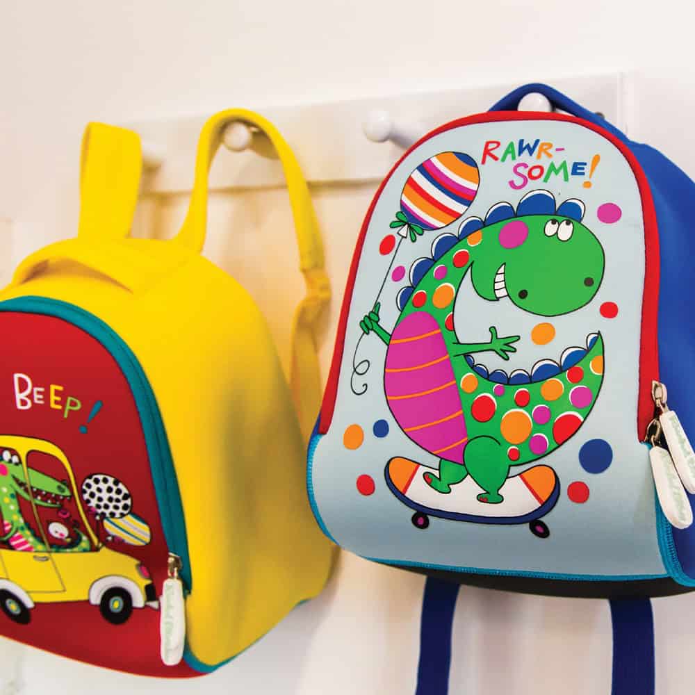 Bright kids' backpacks with colorful dinosaur and car designs, perfect for school and daycare, featuring durable materials and fun patterns.