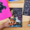 Colorful chalkboard art featuring a unicorn, rainbow, castle, and girl princess drawing at The Wraperie, inspiring creativity and fun with educational art kits and craft supplies for kids.