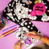 Bright colorful unicorn and rainbow velvet coloring books for kids at The Wraperie, featuring easy-to-color illustrations and vibrant markers for creative fun and relaxation.