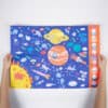 Colorful space-themed puzzle with planets, astronauts, rockets, and stars, designed for kids and families while promoting educational fun and creativity.