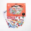 Colorful cardboard city 3D paper toy set for kids, featuring buildings, vehicles, and various urban elements for creative play and DIY assembly.