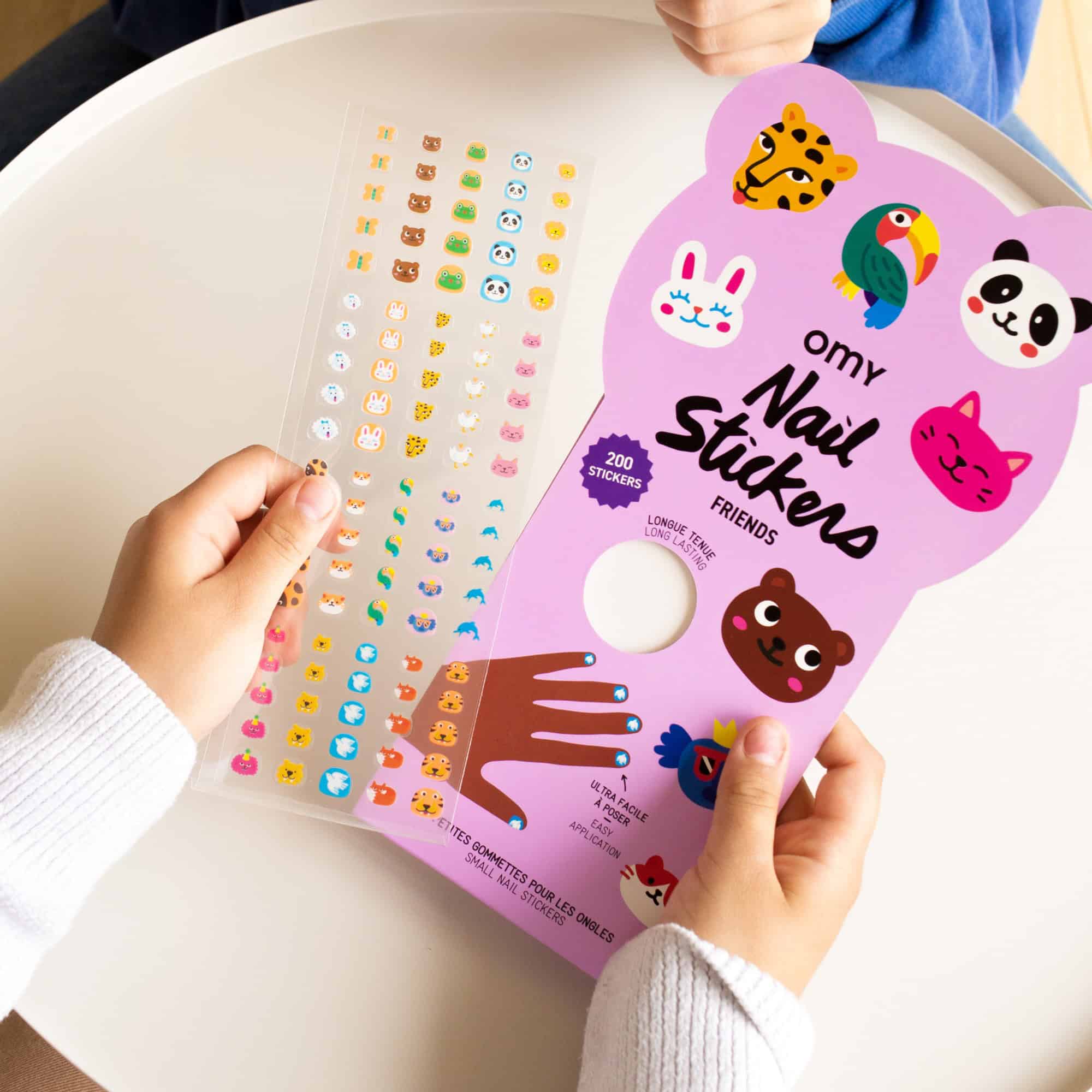 Colorful animal and smiley face nail stickers perfect for fun, easy nail art at The Wraperie for kids and adults. Includes 200 long-lasting stickers with adorable designs for all ages.