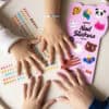 Colorful animal-themed nail stickers on fingers, showcasing fun nail art with stickers from The Wraperie’s nail sticker pack. Perfect for kids and teens to create cute, long-lasting nail designs.