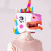Colorful unicorn-themed cardboard mask, whimsical costume accessory, playful headgear for kids or parties, featuring vibrant rainbow colors and fun facial designs.