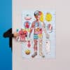 Colorful human body educational poster for kids with illustrations of internal organs and systems at The Wraperie, a creative design studio.