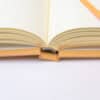 Freshly opened notebook with blank pages, ideal for journaling, note-taking, or writing. Perfect stationery for students, writers, or professionals looking for quality notebooks.