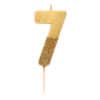 Gold glitter number 7 birthday candle on a white background.