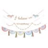 Colorful unicorn-themed party decorations including a 