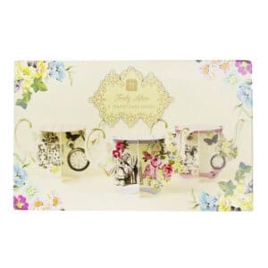 Delicate tea cup and cake stand set with floral and whimsical design, perfect for tea parties and elegant gatherings. Beautifully decorated and ideal for showcasing desserts or serving tea.