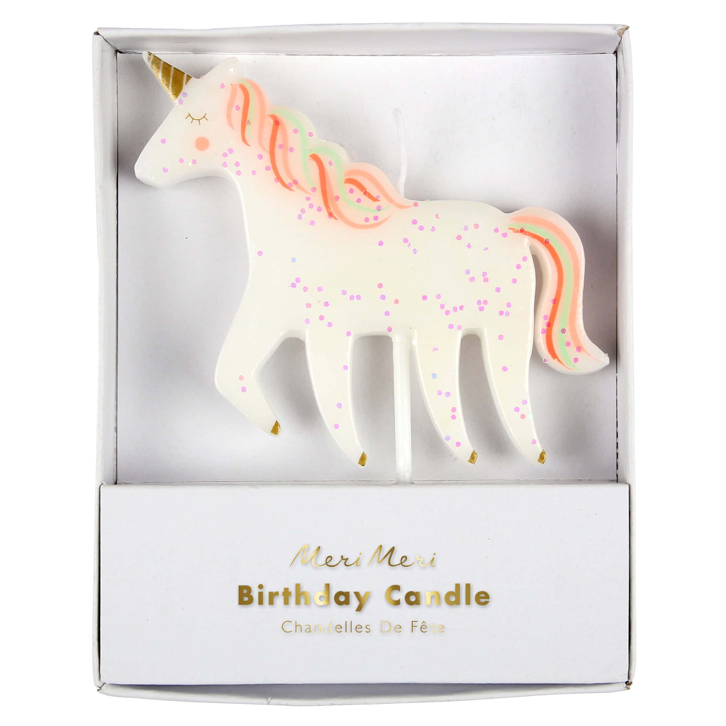 Cute unicorn-shaped birthday candle with pastel rainbow mane, pink glitter accents, and gold horn, perfect for children's birthdays and party decor.