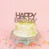 Untitled photo of a birthday cake with sprinkles, colorful 