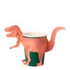 A dinosaur-themed cup holder featuring a pink T-Rex design, perfect for kids and dinosaur enthusiasts, made by The Wraperie. Fun, functional, and creatively designed for playful environments.