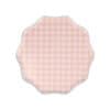 Pink gingham fabric cover with scalloped edges, ideal for serving trays or table decor at The Wraperie, specializing in customized wraps, food presentation, and catering accessories.
