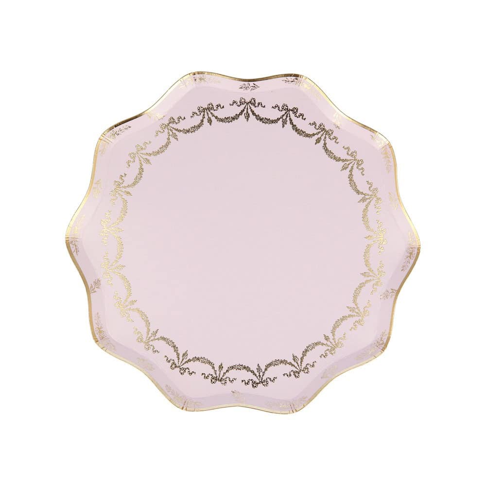 Elegant pink serving platter with gold accents, perfect for entertaining and special occasions. Unique scalloped edges add a touch of luxury to your table setting.