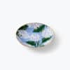 Colorful ceramic bowl with floral and leaf design, perfect for serving or decorative use.