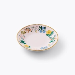 Colorful floral patterned ceramic bowl with gold rim, perfect for serving and decorating, from The Wraperie collection. Ideal for adding a touch of elegance and charm to your table setting.