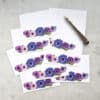 Colorful floral vegetable or herb stickers on white cards, perfect for decorating jars, packages, or crafts, showcasing vibrant purple, pink, and blue flowers for floral-themed branding or gift-wrap embellishments.