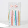 Colorful birthday candles greeting card with confetti, ideal for celebrations and special occasions from The Wraperie.