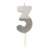 Number 3 candle with a silver glitter finish, shaped like the number 3, perfect for birthday celebrations and special occasions at The Wraperie.