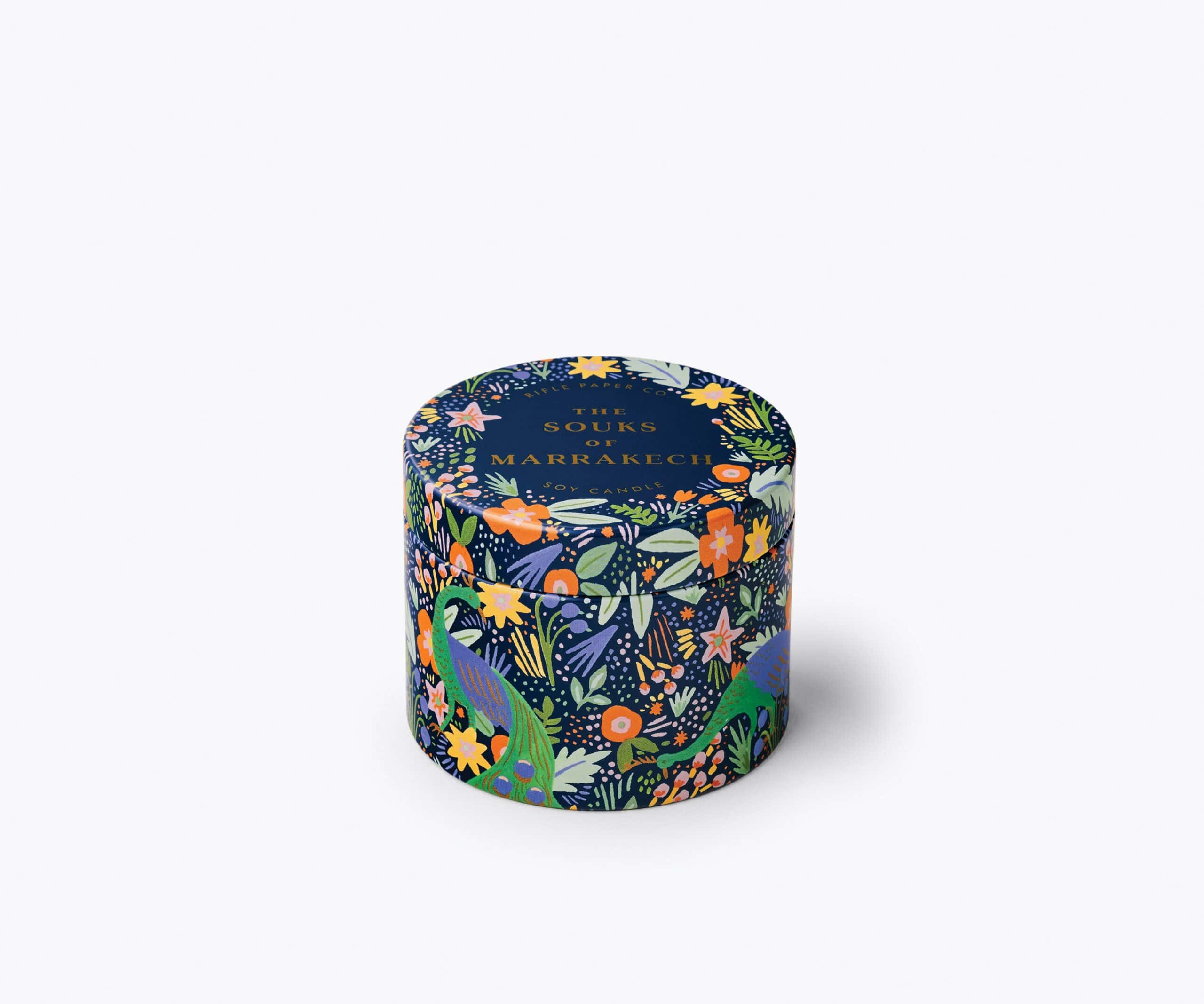 Vibrant decorative candle packaging with floral and animal illustrations, perfect for home decor and gift setting, featuring "The Souks of Marrakech" soy candle design.
