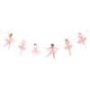 Colorful ballet dancers wearing pink tutus performing on a slackline, showcasing flexibility and grace at The Wraperie event. Perfect for ballet, dance, and entertainment themes.