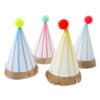 Bright colorful party hats with pom-poms in pink, yellow, blue, and mint, perfect for kids' birthday celebrations and party decor.