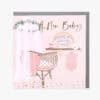 Colorful baby shower invitation with pink pastels, rainbow, and decorative elements for a celebration of a new baby girl at The Wraperie.