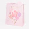 Colorful baby girl themed gift bag with pink balloons, star accents, and “A Lovely New Baby Girl” printed design for celebrating newborn girls.