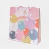 Colorful balloon gift bag with "For You" message, rainbow design, and pastel tones, perfect for celebrations and gift-giving from The Wraperie.