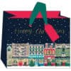 Colorful holiday-themed gift box from The Wraperie with festive illustrations of buildings and Christmas decorations, perfect for wrapping Christmas presents.