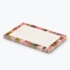 Notepad with floral border design for organization or note-taking at The Wraperie.