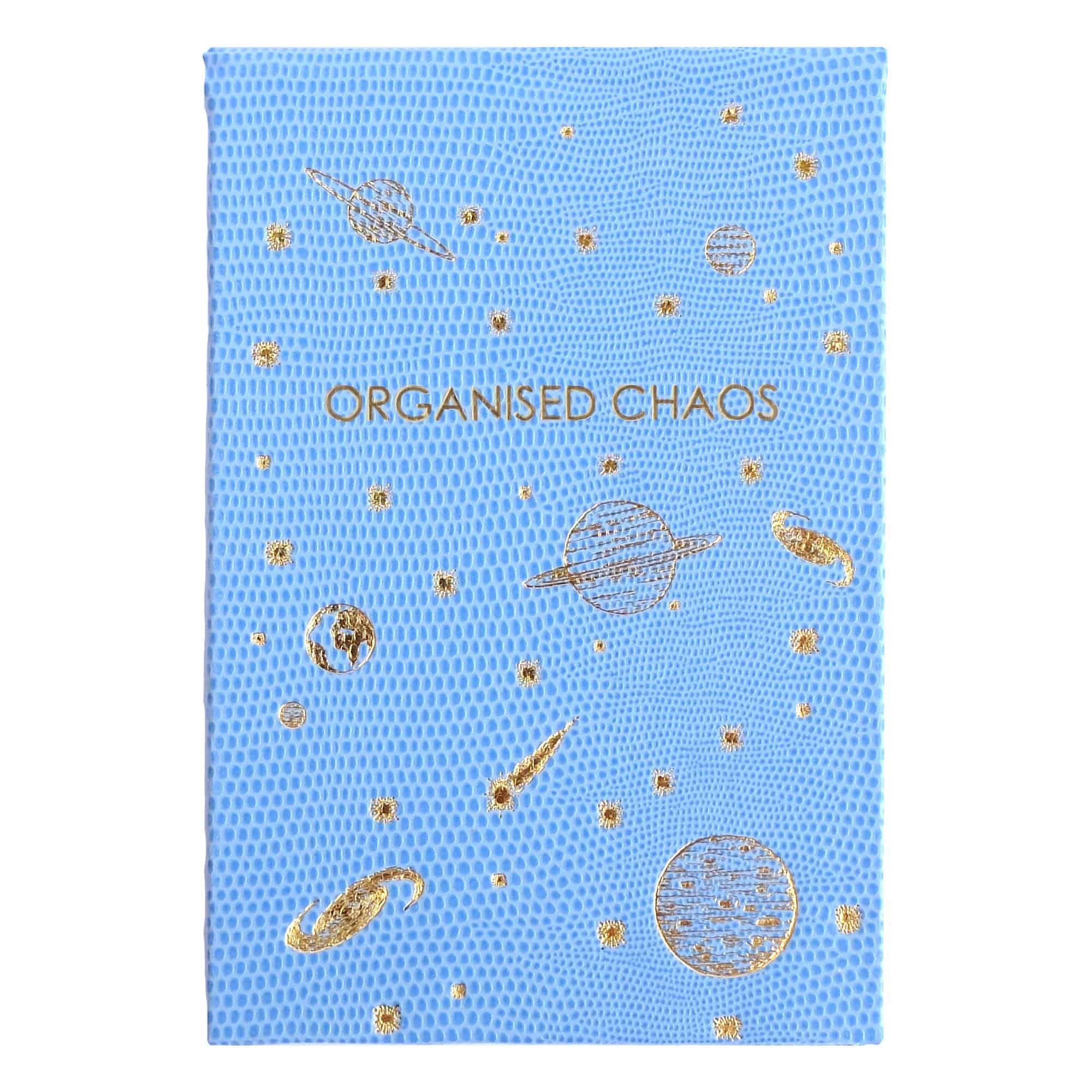 Bright blue packaging of The Wraperie's Organised Chaos wrap with gold space-themed illustrations, including planets and stars, designed for versatile and stylish food wraps.