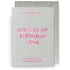 Vibrant birthday greeting card from The Wraperie with pink text on a light gray background, perfect for celebrating loved ones.