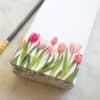 Colorful tulip floral print notepad with pink and peach flowers, perfect for spring stationery, journaling, and note-taking. Elegant floral design for home or office use.