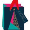 Vibrant holiday-themed gift bag from The Wraperie, featuring festive colors and a Christmas tree design, perfect for wrapping presents during the holiday season.