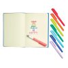 Bright multi-color dry erase markers and an open notebook with the inspirational quote