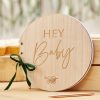 Beautiful wooden sign with engraved text 