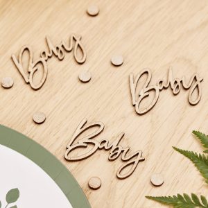 Wooden "Bagu" and "Bye" signs on a light wooden surface with green leaves, ideal for bakery or wedding decor.