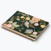 Colorful floral patterned weekly planner designed for organization and journaling at The Wraperie.