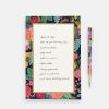 Beautiful floral-themed notepad and matching pen from The Wraperie, ideal for journaling, note-taking, and adding a touch of elegance to your stationery collection.