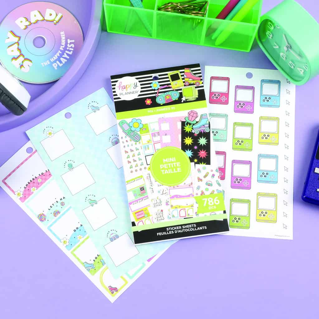 Bright colorful planner sticker sheets with small icons for organizing and decorating planners, perfect for stationery lovers and bullet journal enthusiasts.