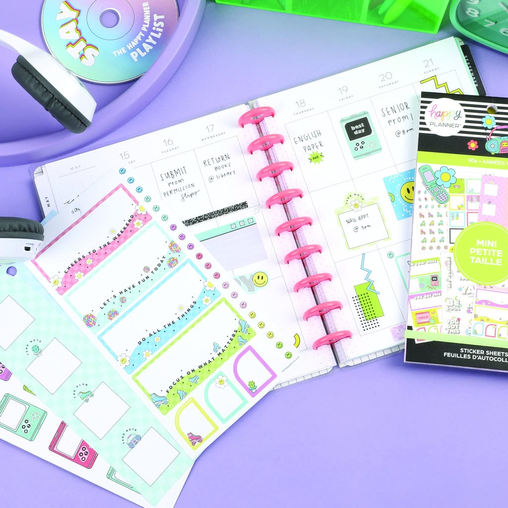 Cute pastel planner pages and stickers for organization and decorating, perfect for school or work scheduling, displayed with stationery on a purple background.