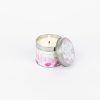 Soft floral scented candle in a decorative tin with pink flower design from The Wraperie, perfect for home decor and gifting.