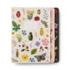Vibrant floral and insect design notebook covers from The Wraperie, perfect for flower lovers and stationery enthusiasts seeking unique, nature-inspired notebooks with colorful details.