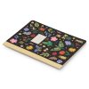 Colorful floral and insect themed notepad with a black cover and gold accents, perfect for journaling and note-taking at The Wraperie.